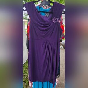 Elegant Purple Dress with Floral Accent